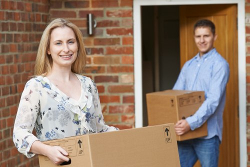 Removal van and moving team preparing for a house move in Grange Park
