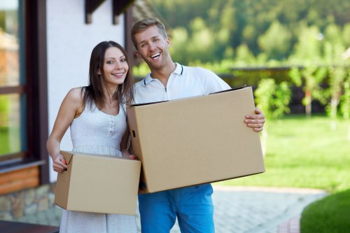 Boxes, furniture, and moving equipment prepared for a removal service