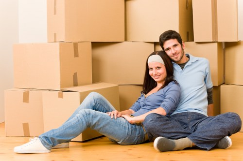 Loading boxes and furniture into a removal truck