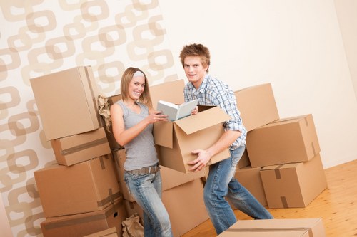Packed boxes and furniture ready for removal in Grange Park