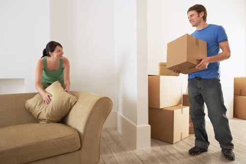 Packed boxes and furniture ready for removals in Grange Park